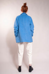 Loose fit, welt chest handwarmer pockets and hidden button hip pockets. Raglan sleeves. Hits at hip. 30% Wool/ 70% Polyester. Fully lined. It's a classic!